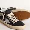 Mid Star in blauw katoen met zilveren ster en leren flash