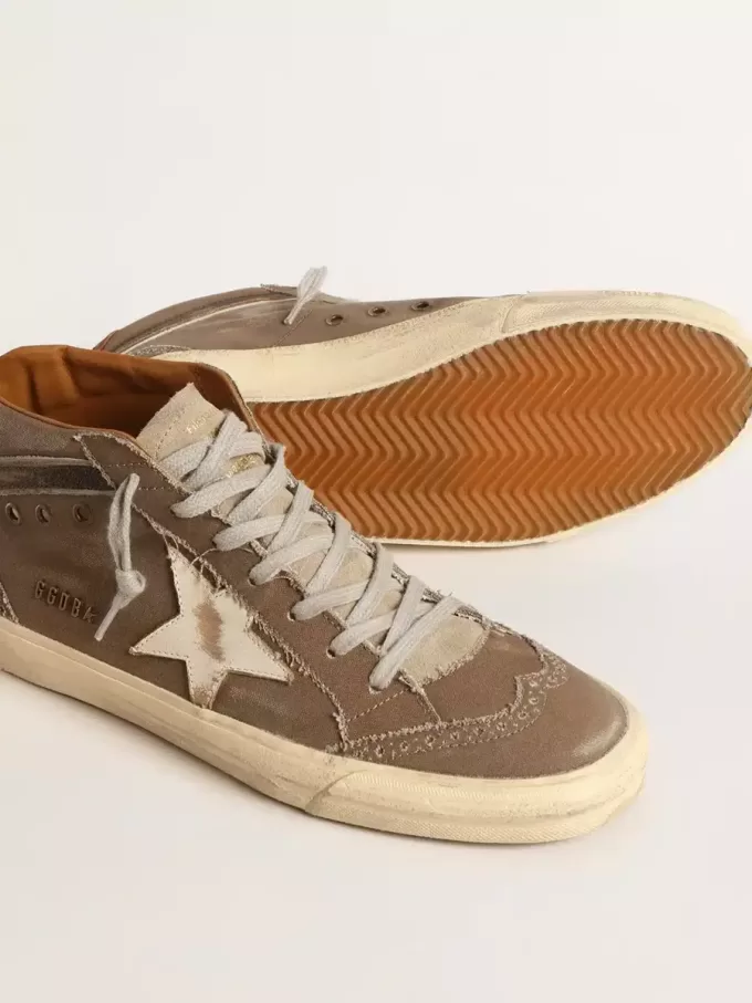 Mid Star in groen canvas met leren ster en zwarte flash