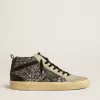 Mid Star LTD in zwart glitter met zwarte leren ster en flash