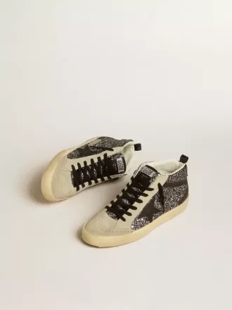 Mid Star LTD in zwart glitter met zwarte leren ster en flash