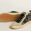 Mid Star LTD in zwart glitter met zwarte leren ster en flash