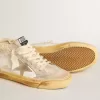Mid Star LTD met parelmoeren suède ster en beige gehaakte hiellip