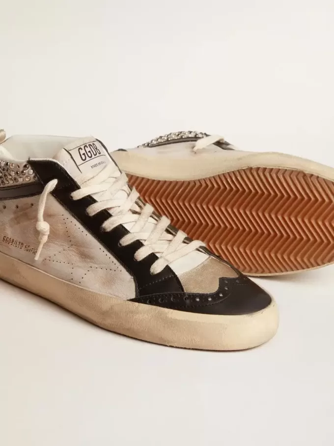 Mid Star LTD voor heren in zwart en wit leer met parels en geperforeerde ster