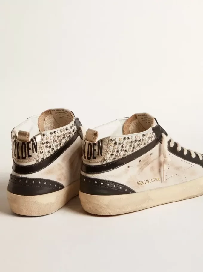 Mid Star LTD voor heren in zwart en wit leer met parels en geperforeerde ster
