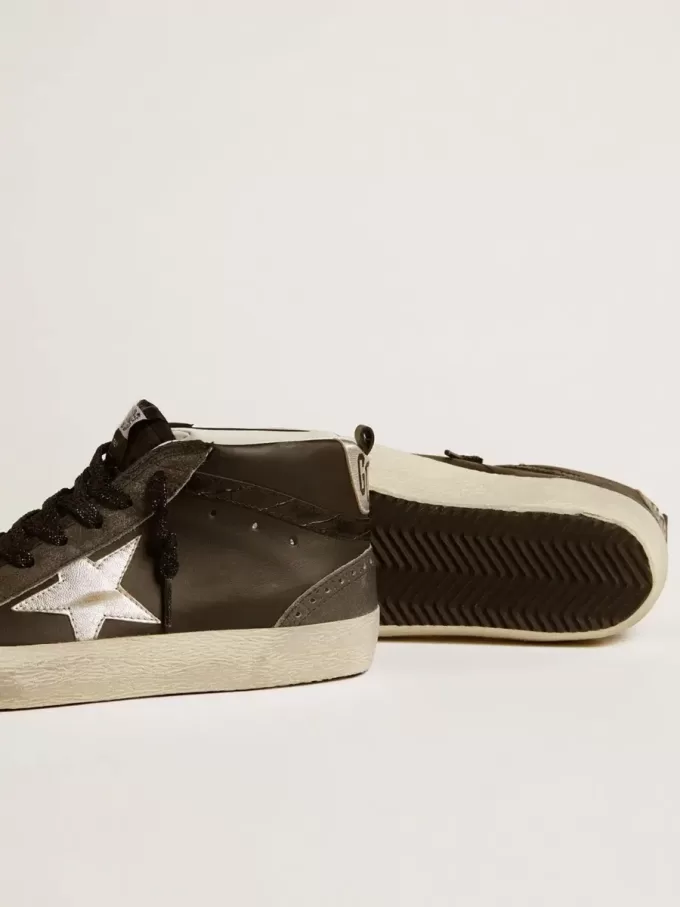 Mid Star voor dames in zwart leer met zilverkleurige metalen leren ster