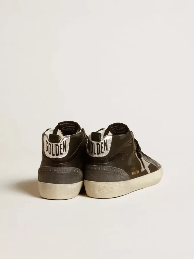 Mid Star voor dames in zwart leer met zilverkleurige metalen leren ster