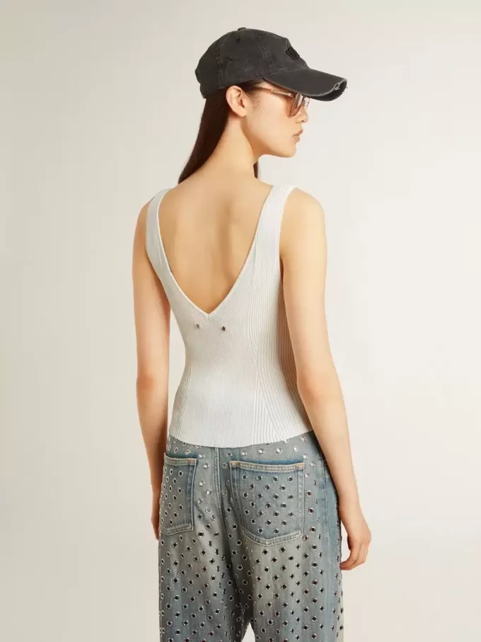 Mouwloze top geborduurd met versleten witte ribbels