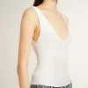 Mouwloze top geborduurd met versleten witte ribbels