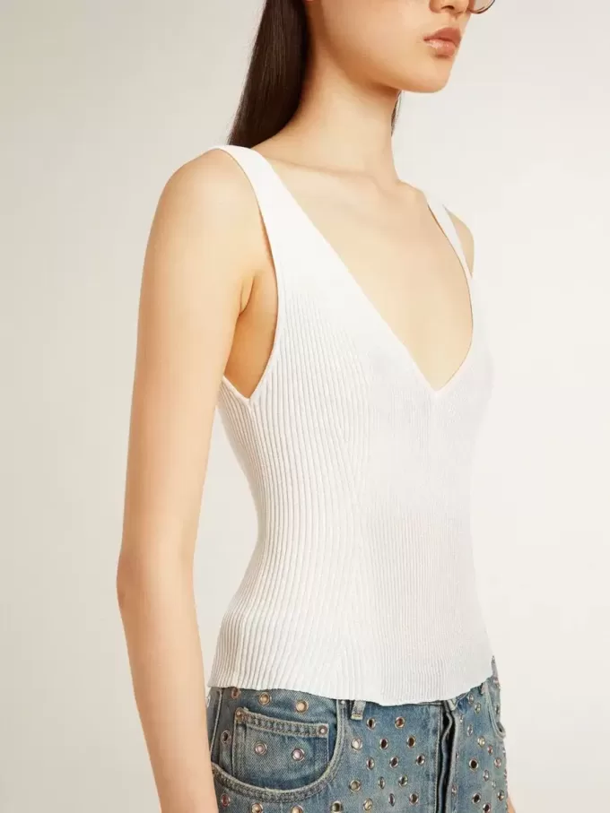 Mouwloze top geborduurd met versleten witte ribbels