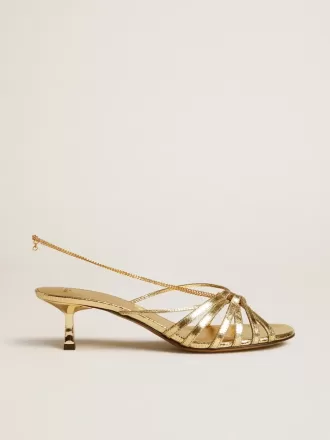 Nico sandalen met kittenhak in metallic goudkleurig leer