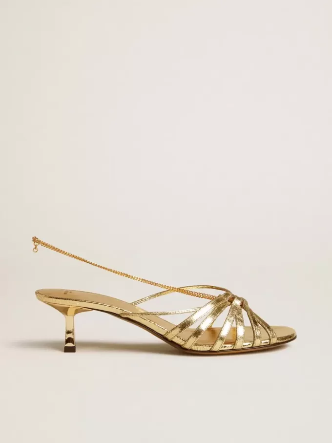 Nico sandalen met kittenhak in metallic goudkleurig leer