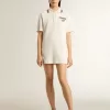 Oasis polojurk voor dames in wit geperforeerd jersey met bordeauxrode strepen