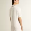 Oasis polojurk voor dames in wit geperforeerd jersey met bordeauxrode strepen