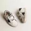 Old School Young met metallic leren ster en zwarte hiellip