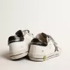 Old School Young met metallic leren ster en zwarte hiellip