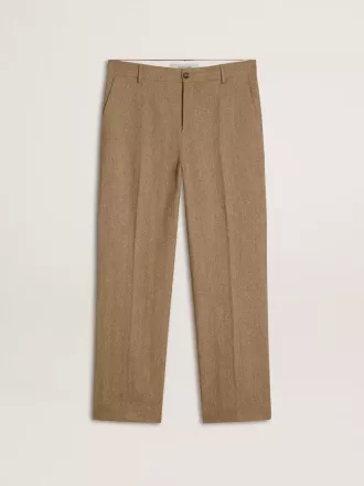 Op maat gemaakte broek in zandkleurig linnen met chevronpatroon
