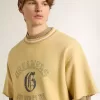 Oversized geel katoenen T-shirt voor heren met blauwe print