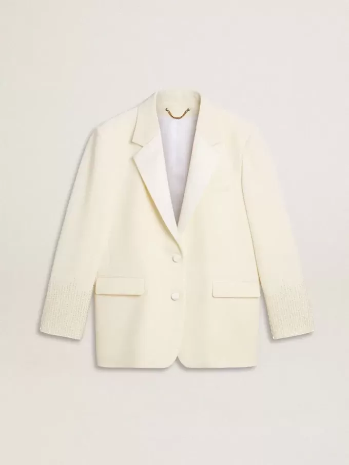 Oversized jasje met enkele knoopsluiting in wit met zijde-effect en borduursels.