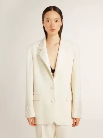 Oversized jasje met enkele knoopsluiting in wit met zijde-effect en borduursels.
