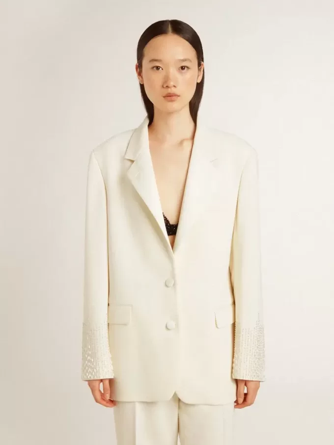 Oversized jasje met enkele knoopsluiting in wit met zijde-effect en borduursels.