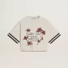 Oversized kort T-shirt voor dames in witte jersey met borduursel en ‘Venezia Mediterraneo’-print.
