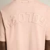 Poederroze T-shirt met omgekeerd logo op de achterkant – Jersey Capsule