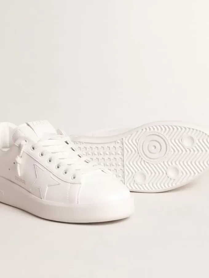 Purestar met witte bio-based ster en matgroene leren hiellip.