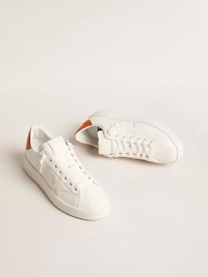 Purestar voor dames met witte leren ster en oranje hielstuk