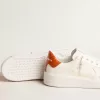 Purestar voor dames met witte leren ster en oranje hielstuk