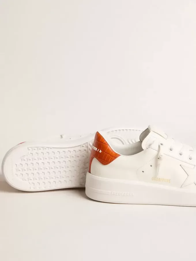 Purestar voor dames met witte leren ster en oranje hielstuk
