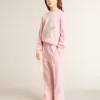 Roze sweatshirt met grote ster in zilveren glitter op de voorkant