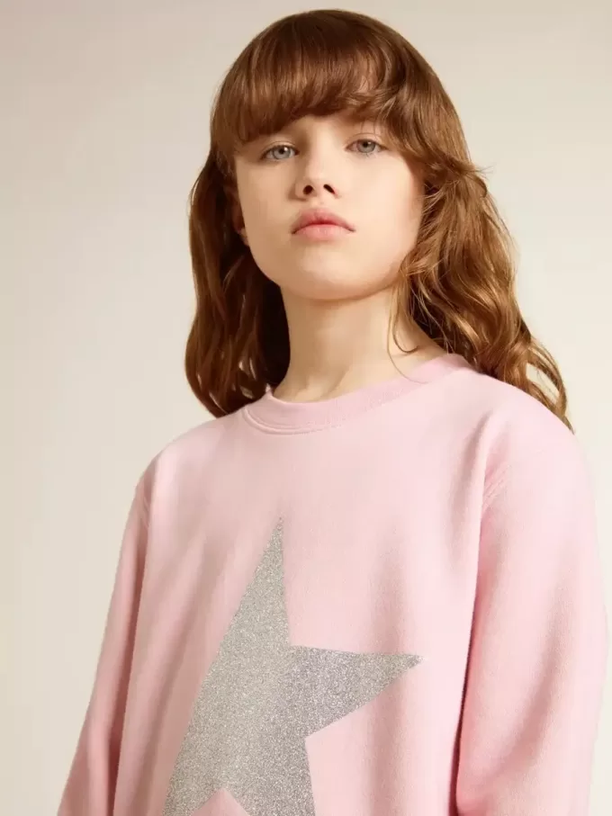 Roze sweatshirt met grote ster in zilveren glitter op de voorkant