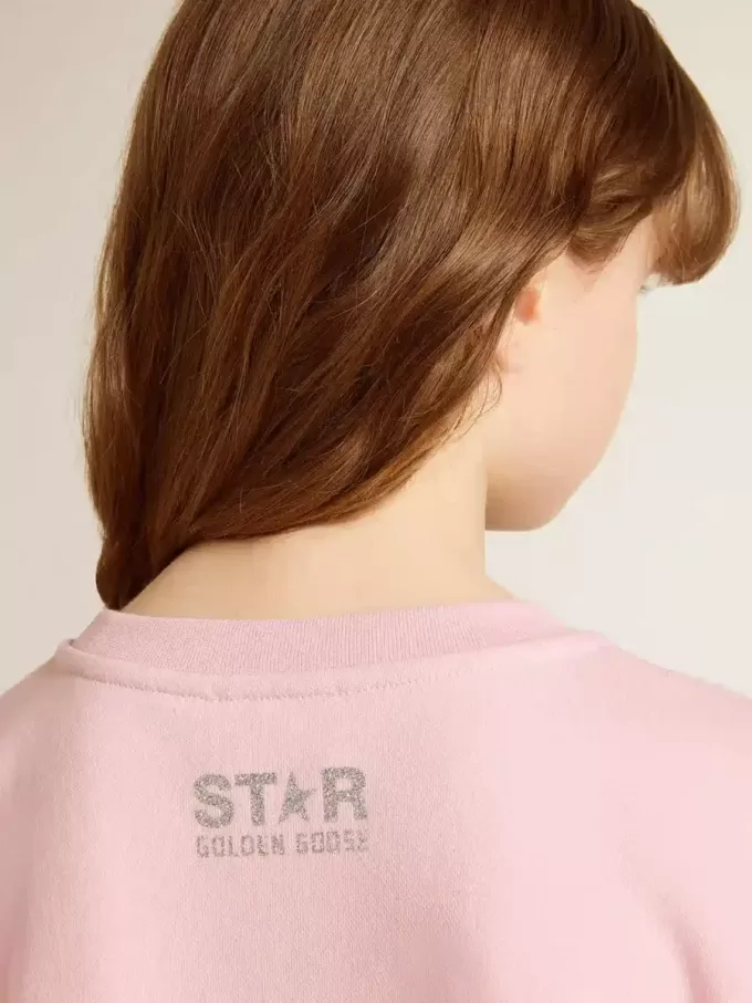 Roze sweatshirt met grote ster in zilveren glitter op de voorkant