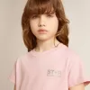 Roze T-shirt voor meisjes met zilveren glitterlogo en grote ster