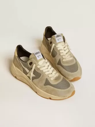 Running Sole in grijs suède met witte ster en witte hielband.