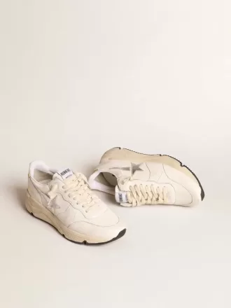Running Sole in nappa met zilveren ster en gouden leren hielstuk