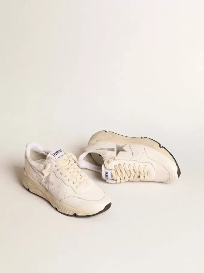 Running Sole in nappa met zilveren ster en gouden leren hielstuk