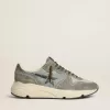 Running Sole voor heren in lichtblauw nylon met zwarte ster en groene leren hielband.