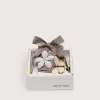 Skin “Sparkling” bruine, zwarte en zilveren visgraatveters met twee applicatiebedeltjes