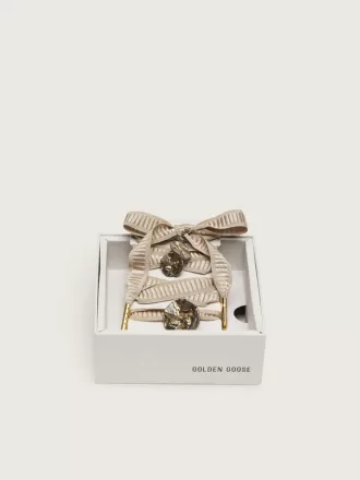 Skin “Vintage” beige geborduurde veters met applicatiebedeltjes
