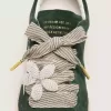 Skin “Vintage” wit en beige gestreepte veters met bloemvormig bedeltje