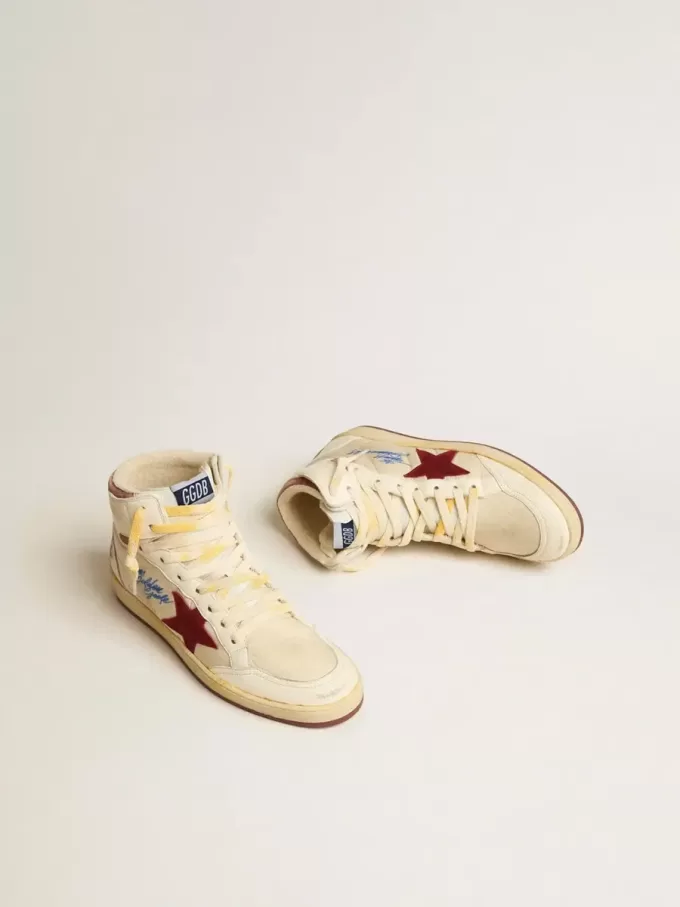 Sky-Star in beige nylon en nappa met granaatappelkleurige suède ster