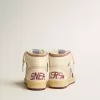 Sky-Star in beige nylon en nappa met granaatappelkleurige suède ster