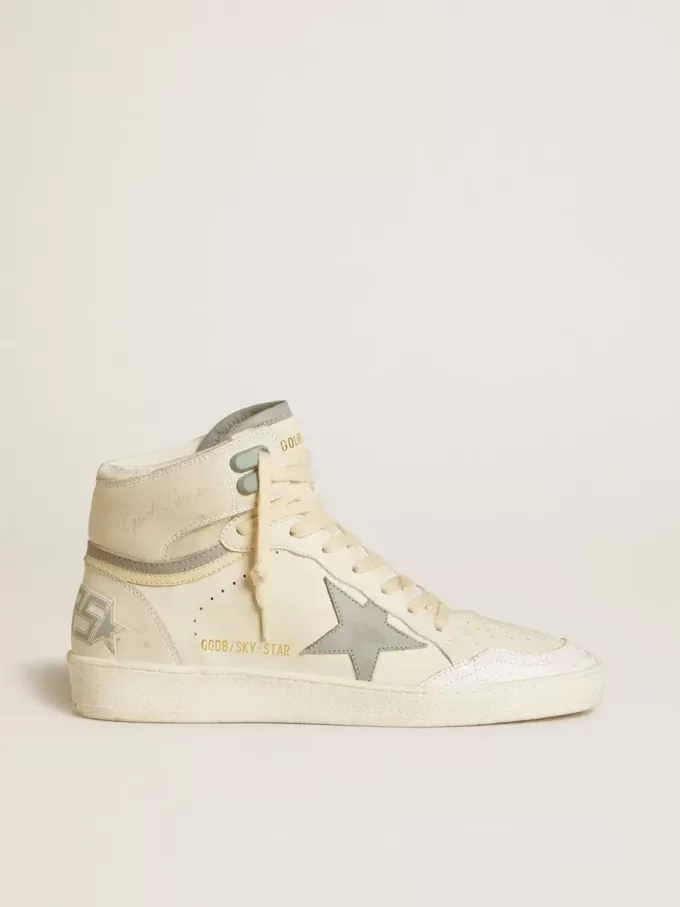 Sky-Star voor dames in leer met lichtblauwe leren ster en witte hielband.