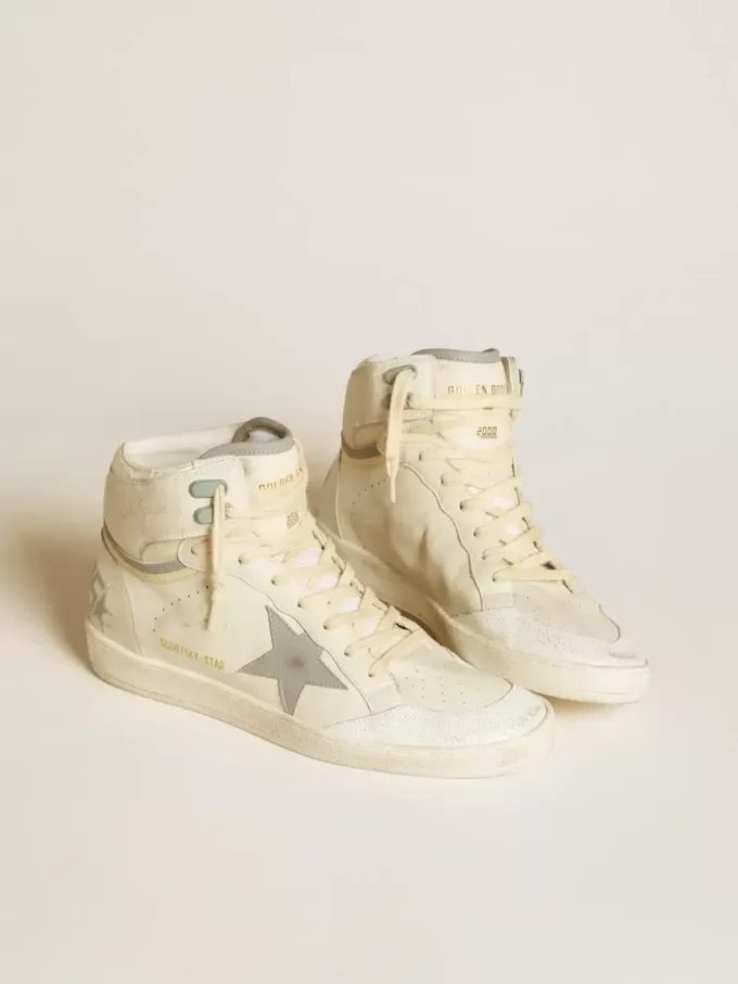 Sky-Star voor heren van leer met lichtblauwe leren ster en witte hiellip.