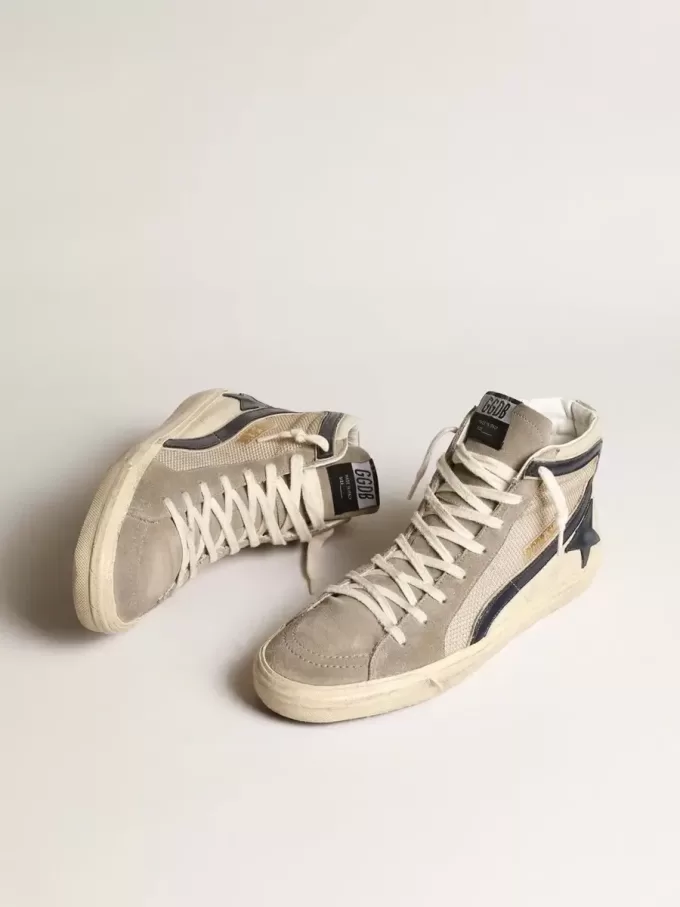 Slide in beige mesh en nylon met blauwe leren ster en flash