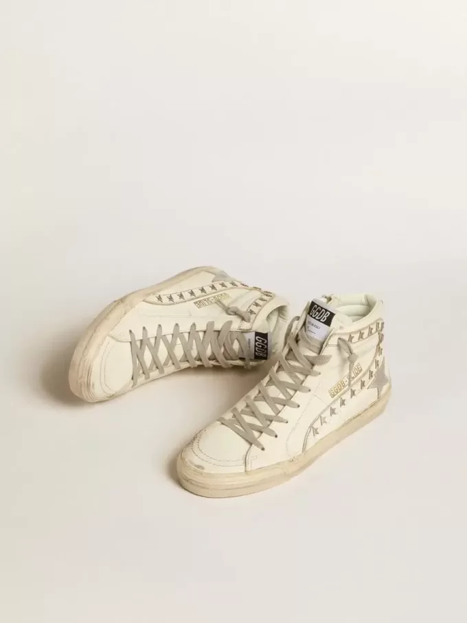 Slide met zilverkleurige metallic leren ster en leren flash met sterren