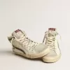 Slipper van beige nappa met groene gelamineerde leren ster en flash