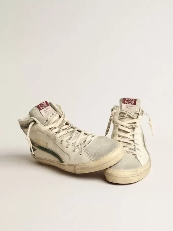 Slipper van beige nappa met groene gelamineerde leren ster en flash