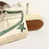 Slipper van beige nappa met groene gelamineerde leren ster en flash